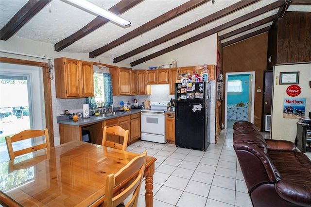 10818 Land O Lakes Blvd, Land O Lakes, FL 34638 - kitchen featuring white range with electric cooktop, freestanding refrigerator, light tile patterned flooring, tasteful backsplash, and brown cabinetry
