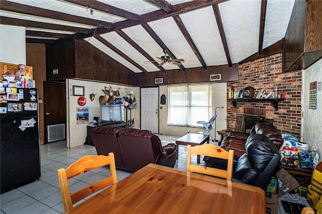 10818 Land O Lakes Blvd, Land O Lakes, FL 34638 - living room with light tile patterned floors, a ceiling fan, wood walls, and a fireplace