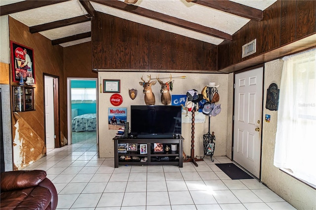 10818 Land O Lakes Blvd, Land O Lakes, FL 34638 - living area featuring light tile patterned flooring and wooden walls