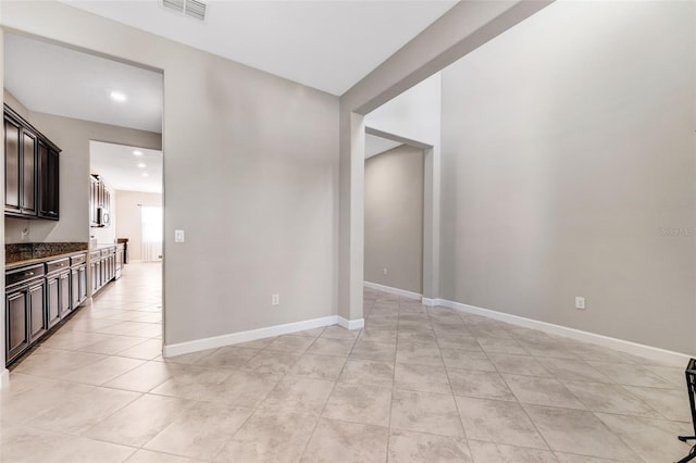 11726 Sunburst Marble Rd, Riverview, FL 33579 - unfurnished room featuring light tile patterned flooring, recessed lighting, and baseboards
