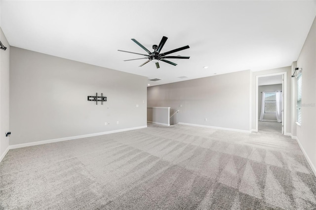 11726 Sunburst Marble Rd, Riverview, FL 33579 - unfurnished living room featuring carpet floors, ceiling fan, and baseboards