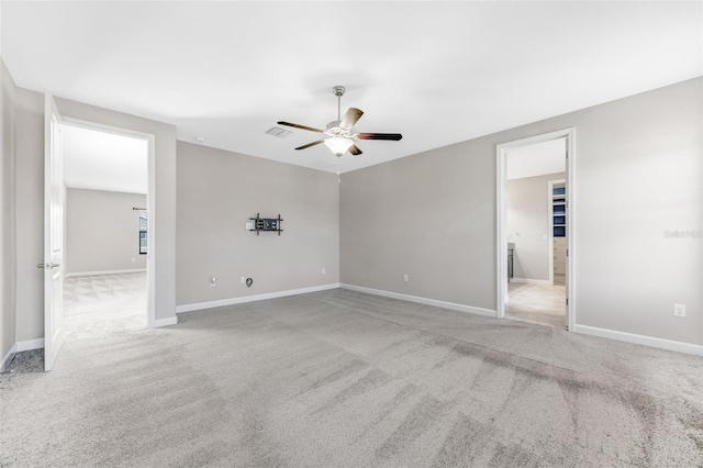11726 Sunburst Marble Rd, Riverview, FL 33579 - spare room featuring ceiling fan, light carpet, and baseboards