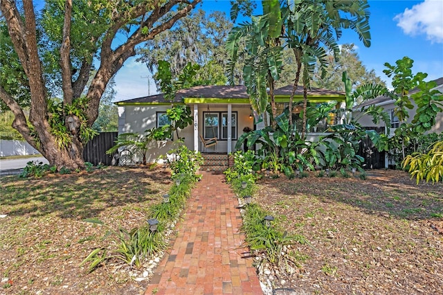 1402 E Mohawk Ave, Tampa, FL 33604 - view of front of home featuring a porch and stucco siding