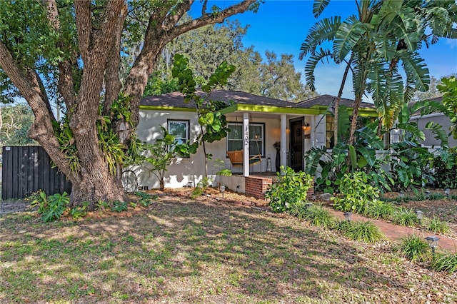 1402 E Mohawk Ave, Tampa, FL 33604 - view of front of property featuring stucco siding and a porch
