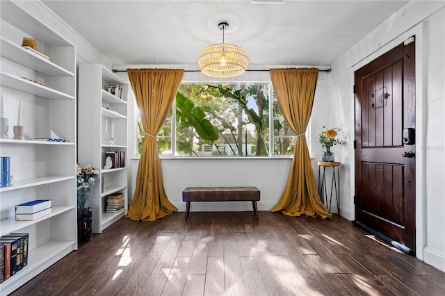 1402 E Mohawk Ave, Tampa, FL 33604 - sitting room with dark wood-type flooring
