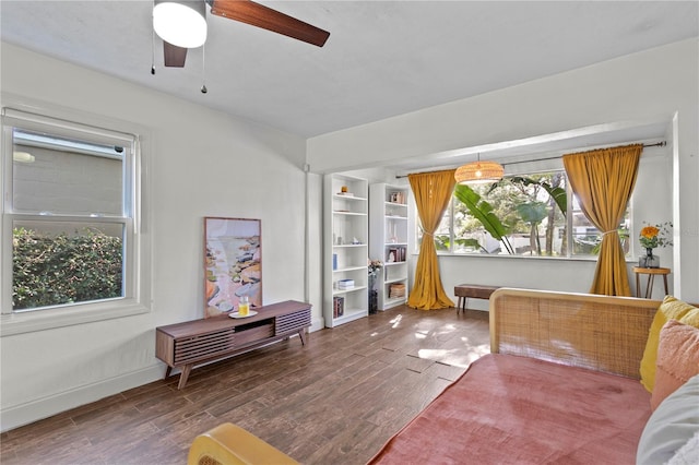 1402 E Mohawk Ave, Tampa, FL 33604 - sitting room with plenty of natural light, ceiling fan, and wood finished floors