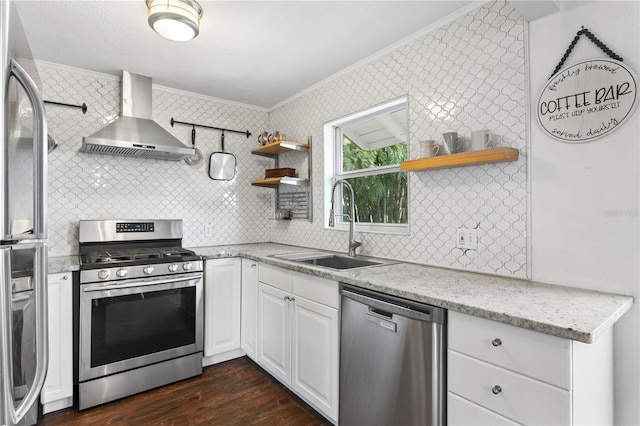 1402 E Mohawk Ave, Tampa, FL 33604 - kitchen with stainless steel appliances, wall chimney range hood, crown molding, open shelves, and a sink