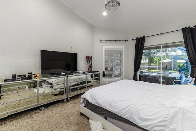 447 Bridle Path Way, Tarpon Springs, FL 34688 - bedroom with vaulted ceiling, access to outside, and carpet