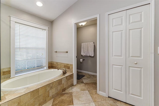 447 Bridle Path Way, Tarpon Springs, FL 34688 - bathroom featuring a closet and a bath
