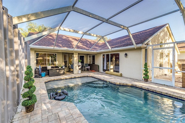 447 Bridle Path Way, Tarpon Springs, FL 34688 - outdoor pool featuring an outdoor living space, a patio, and a lanai