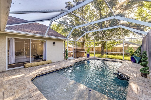 447 Bridle Path Way, Tarpon Springs, FL 34688 - view of pool featuring a fenced backyard, a patio, and glass enclosure