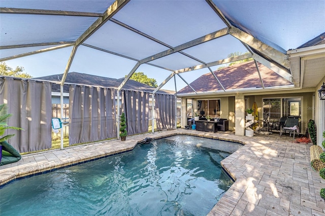 447 Bridle Path Way, Tarpon Springs, FL 34688 - outdoor pool featuring a patio, outdoor lounge area, and glass enclosure
