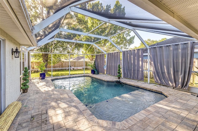 447 Bridle Path Way, Tarpon Springs, FL 34688 - view of swimming pool with a patio, a fenced backyard, and a lanai