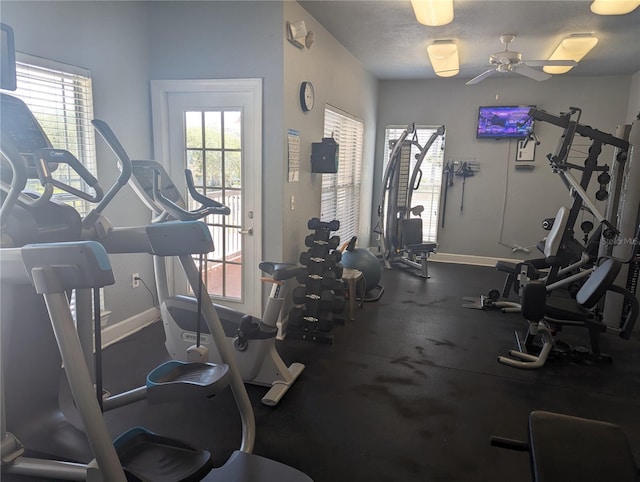 1216 S Missouri Ave Unit 223, Clearwater, FL 33756 - exercise room with healthy amount of natural light, baseboards, and a ceiling fan