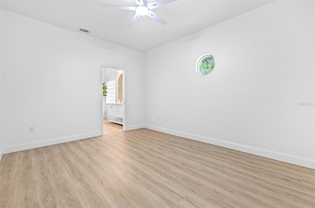 7644 Conrad St, Wesley Chapel, FL 33544 - unfurnished room with ceiling fan, light wood-type flooring, baseboards, and vaulted ceiling