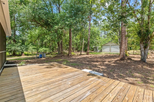 7644 Conrad St, Wesley Chapel, FL 33544 - wooden deck featuring an outbuilding and a garage