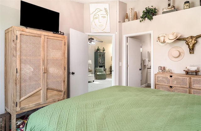 2403 Nantucket Field Way Unit 27, Sun City Center, FL 33573 - carpeted bedroom featuring connected bathroom