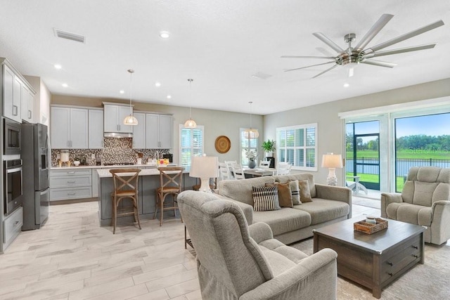 6097 Golden Nettle Dr, Apollo Beach, FL 33572 - living area featuring recessed lighting and a ceiling fan