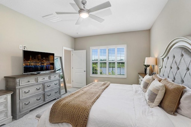 6097 Golden Nettle Dr, Apollo Beach, FL 33572 - bedroom featuring light colored carpet, a ceiling fan, and baseboards