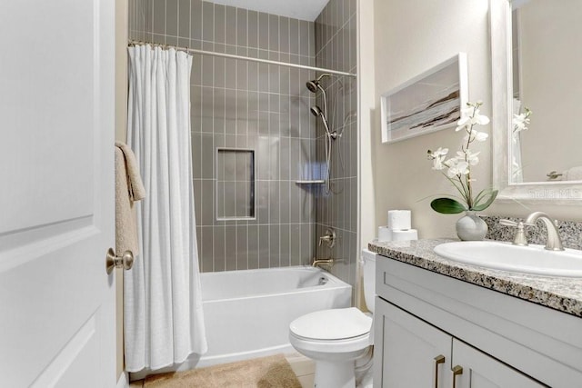 6097 Golden Nettle Dr, Apollo Beach, FL 33572 - full bathroom with toilet, vanity, and shower / bath combo with shower curtain