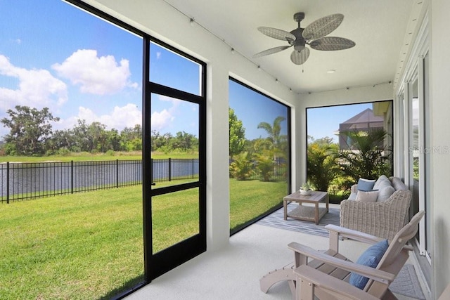 6097 Golden Nettle Dr, Apollo Beach, FL 33572 - sunroom / solarium featuring a water view and ceiling fan