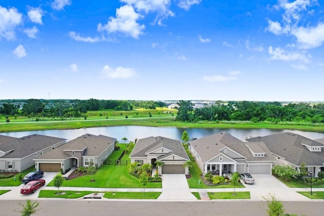 6097 Golden Nettle Dr, Apollo Beach, FL 33572 - aerial view of residential area featuring a nearby body of water