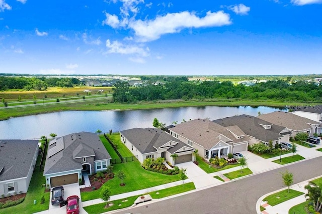 6097 Golden Nettle Dr, Apollo Beach, FL 33572 - aerial view of residential area with a nearby body of water