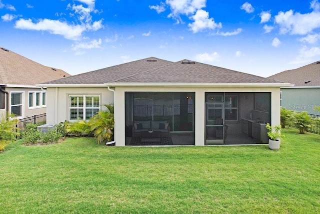 6097 Golden Nettle Dr, Apollo Beach, FL 33572 - back of property featuring a sunroom, roof with shingles, and stucco siding