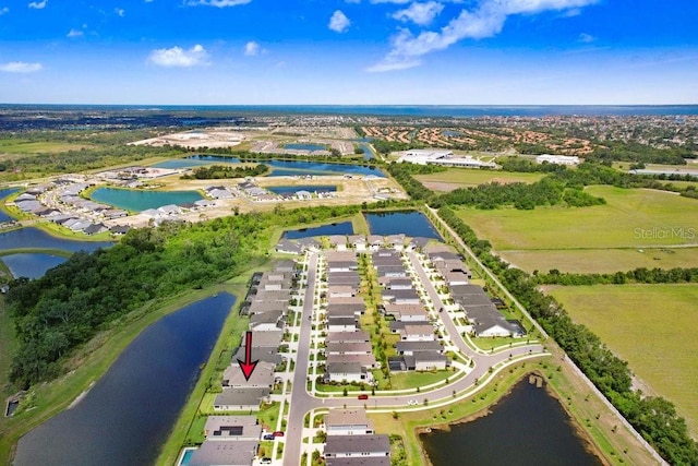 6097 Golden Nettle Dr, Apollo Beach, FL 33572 - aerial perspective of suburban area with a large body of water