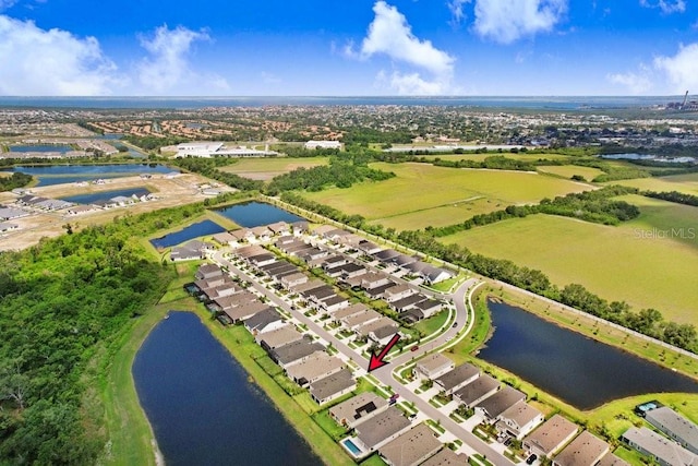 6097 Golden Nettle Dr, Apollo Beach, FL 33572 - aerial perspective of suburban area featuring a large body of water