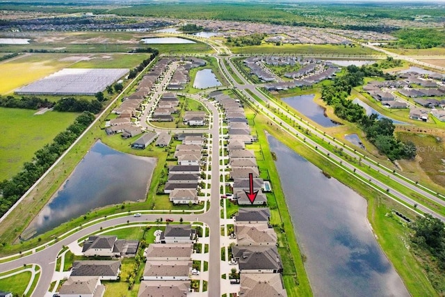6097 Golden Nettle Dr, Apollo Beach, FL 33572 - aerial view of residential area with a large body of water