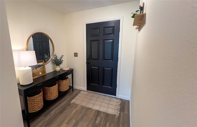 10123 Carp Hollow Rd, Sun City Center, FL 33573 - foyer entrance with wood finished floors and baseboards