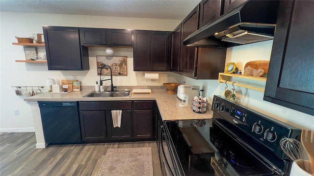 10123 Carp Hollow Rd, Sun City Center, FL 33573 - kitchen with black appliances, open shelves, a sink, under cabinet range hood, and light wood-style floors