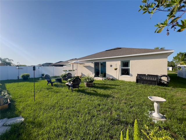 10123 Carp Hollow Rd, Sun City Center, FL 33573 - back of property with stucco siding