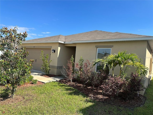 1509 Venice Ln, Davenport, FL 33896 - view of front of home with stucco siding, a garage, and a front yard