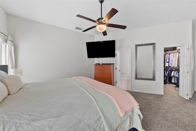 11927 Steppingstone Blvd, Tampa, FL 33635 - bedroom featuring carpet flooring, a spacious closet, a ceiling fan, ensuite bath, and a closet