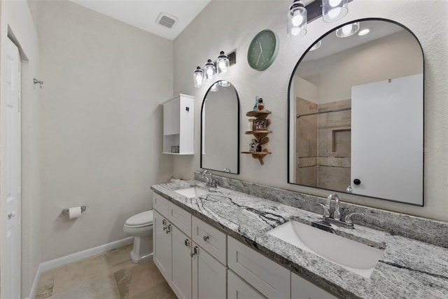 11927 Steppingstone Blvd, Tampa, FL 33635 - full bath featuring toilet, double vanity, a tile shower, and baseboards
