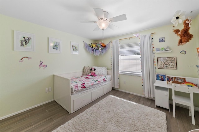 11927 Steppingstone Blvd, Tampa, FL 33635 - bedroom featuring wood finished floors, baseboards, and a ceiling fan