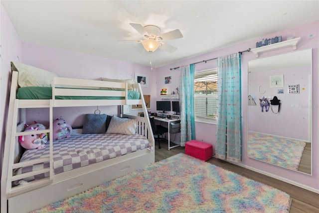 11927 Steppingstone Blvd, Tampa, FL 33635 - bedroom with wood finished floors, baseboards, ceiling fan, and a desk