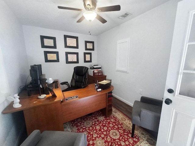 11927 Steppingstone Blvd, Tampa, FL 33635 - home office featuring wood finished floors, a ceiling fan, and baseboards