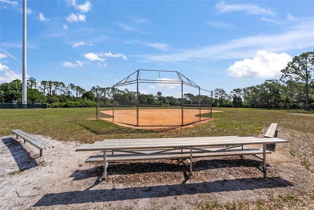 11927 Steppingstone Blvd, Tampa, FL 33635 - surrounding community with a gazebo, a lawn, and view of wooded area