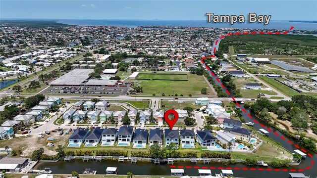 6530 Simone Shores Cir, Apollo Beach, FL 33572 - aerial view of property's location with a large body of water and nearby suburban area