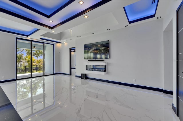6530 Simone Shores Cir, Apollo Beach, FL 33572 - unfurnished living room featuring marble tiled floors, a tray ceiling, and recessed lighting