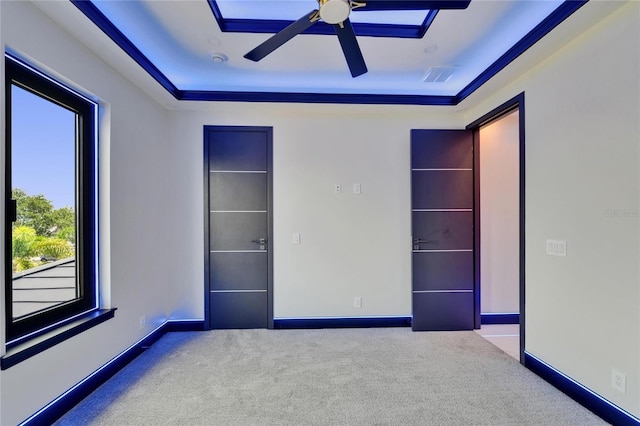 6530 Simone Shores Cir, Apollo Beach, FL 33572 - unfurnished room with carpet flooring, ceiling fan, baseboards, and a tray ceiling