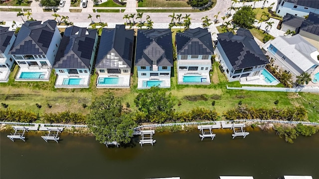 6530 Simone Shores Cir, Apollo Beach, FL 33572 - aerial view of residential area with a pool and a nearby body of water