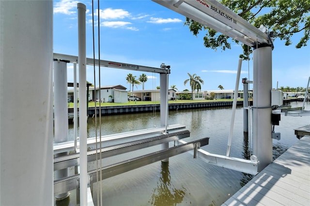 6530 Simone Shores Cir, Apollo Beach, FL 33572 - dock with boat lift and a water view