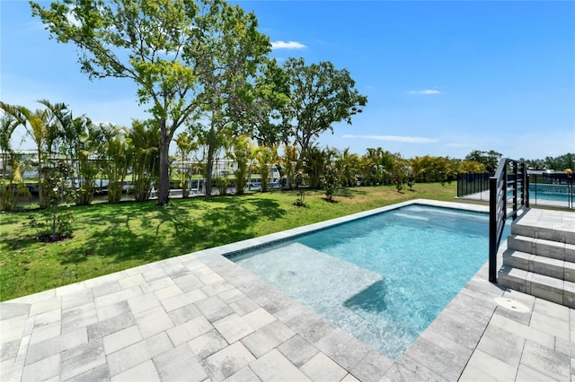 6530 Simone Shores Cir, Apollo Beach, FL 33572 - swimming pool featuring a yard and a patio area