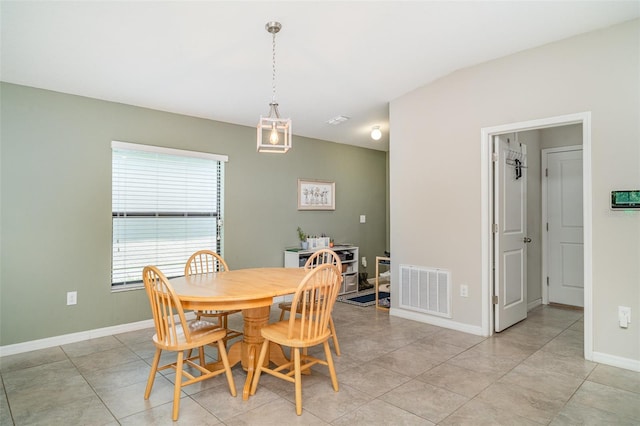 10104 Carloway Hills Dr, Wimauma, FL 33598 - dining area with baseboards and light tile patterned flooring