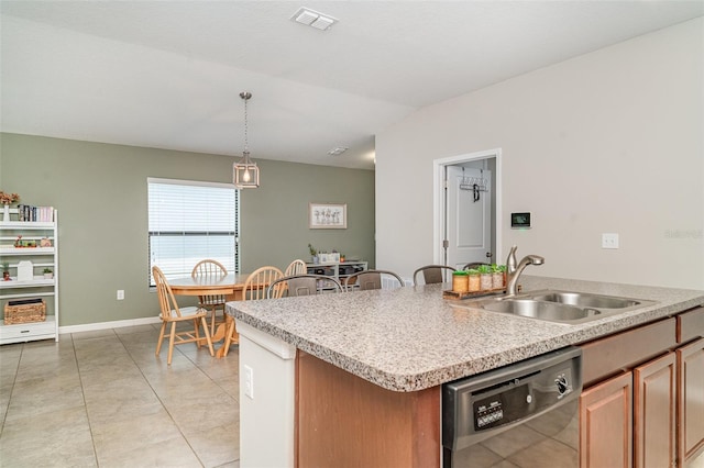 10104 Carloway Hills Dr, Wimauma, FL 33598 - kitchen featuring black dishwasher, a sink, light countertops, a center island with sink, and decorative light fixtures