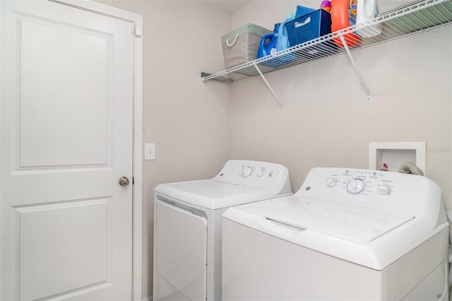 10104 Carloway Hills Dr, Wimauma, FL 33598 - laundry room with washer and clothes dryer